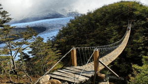 The suspension bridge in the figure was designed to be in rotational equilibrium.